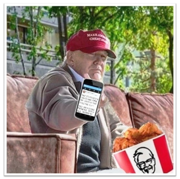 Donald Trump plays with his phone.